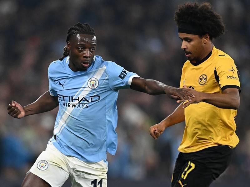 英格兰足球超级联赛英超两场强强对话曼联重演冠军对决曼城利物浦力争完美一周