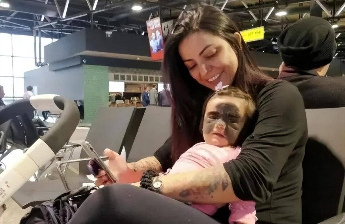 i am a princess: florida girl, two, has her batman mask