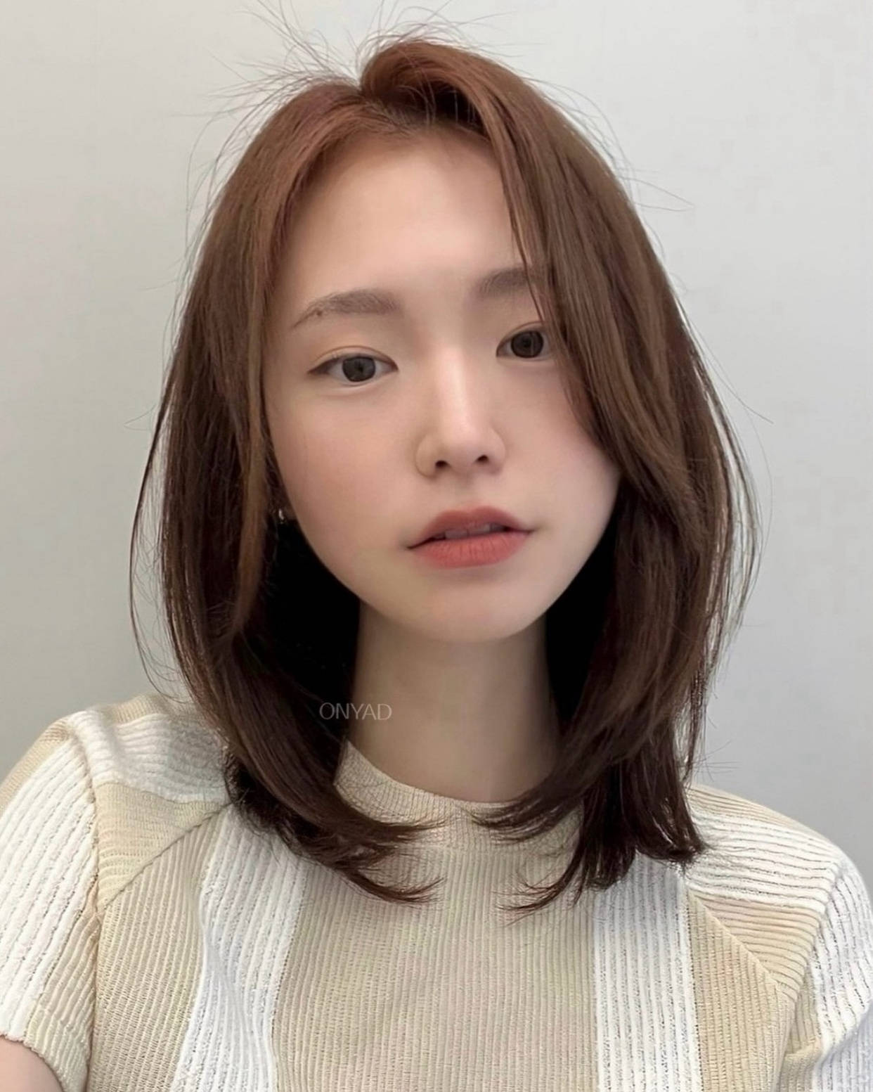 锁骨发内扣女性修颜的时尚之选
