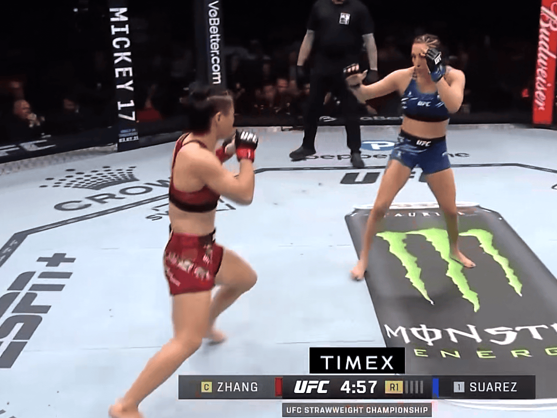 惊！张伟丽UFC312卫冕战，实力碾压对手 张伟丽在UFC312卫冕：一场实力与拼搏的较量