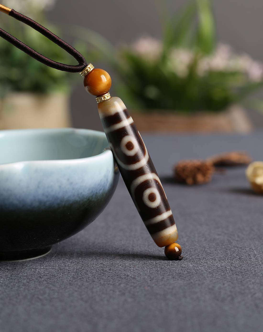 一眼辨真假：九眼天珠如何鉴定？_搜狐网