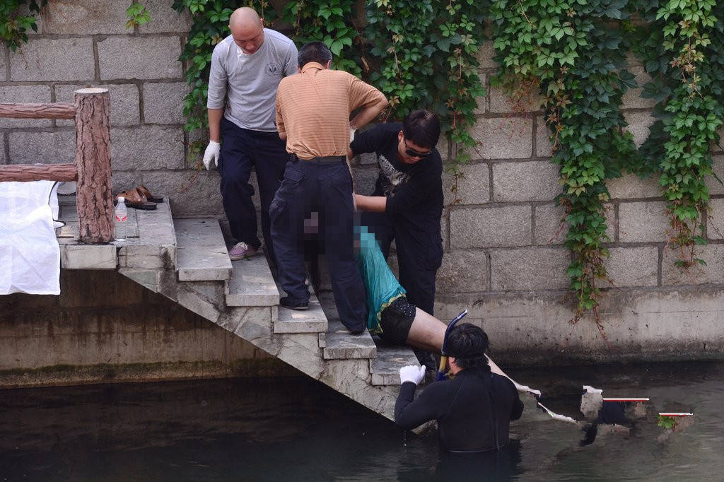 原创河中惊现无头女尸案件久未破获十八年后凶犯被锁定