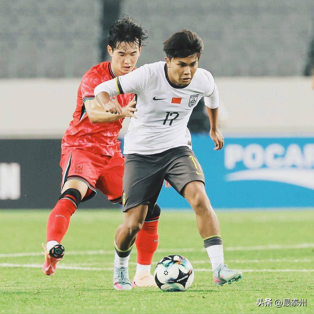 国足1-0胜中国香港：荣誉之战中的顽强与希望