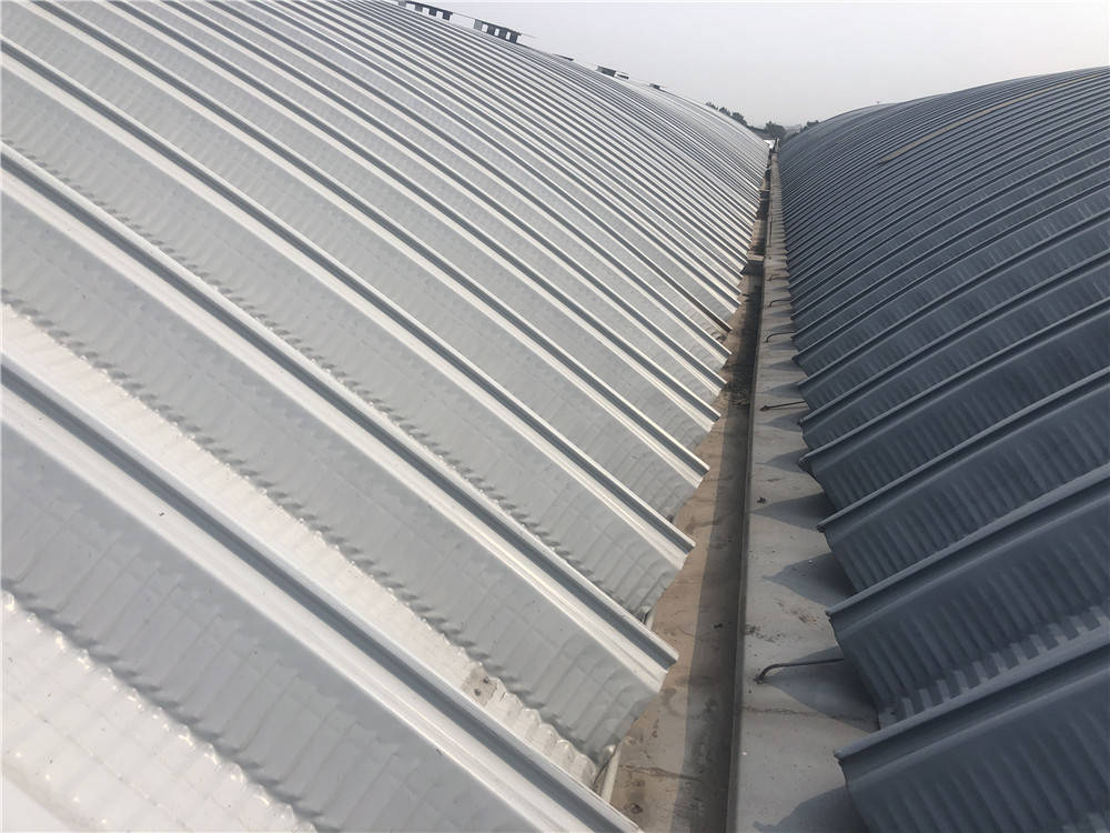 揭秘拱形波纹钢屋盖的成本构成与节约策略