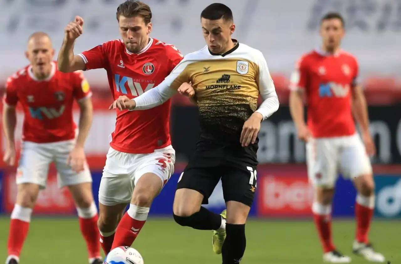 【周二003 英锦标赛深度解析:唐卡斯特vs哈德斯菲尔德,绿茵场上的较量