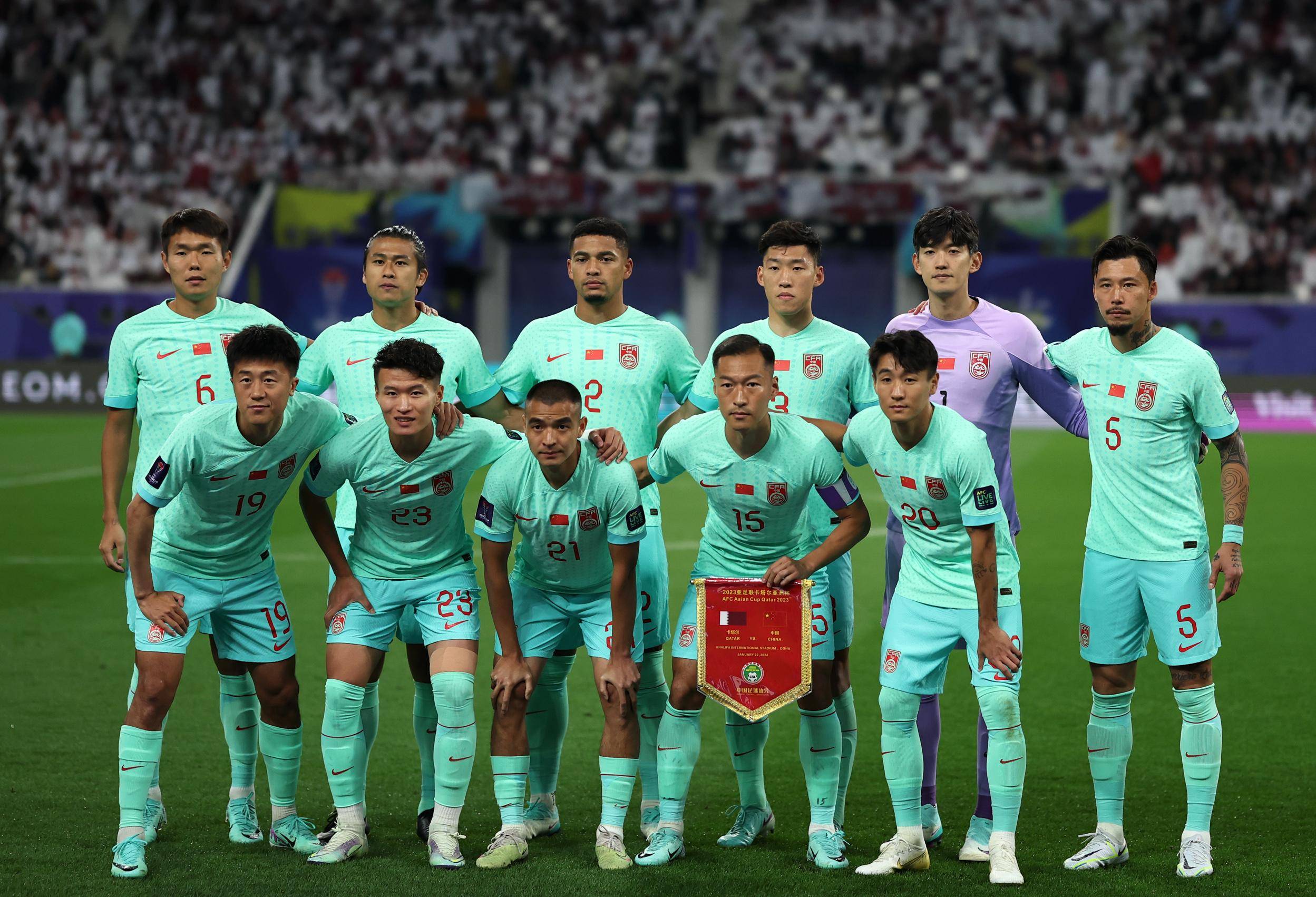 亚洲杯小组赛:中国队对阵卡塔尔队_新华社_比赛_球员
