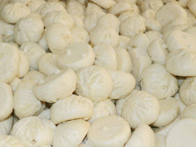 日上 情暖人心——我校为教职工提供春节蒸包子服务_食堂_寓意_大家庭