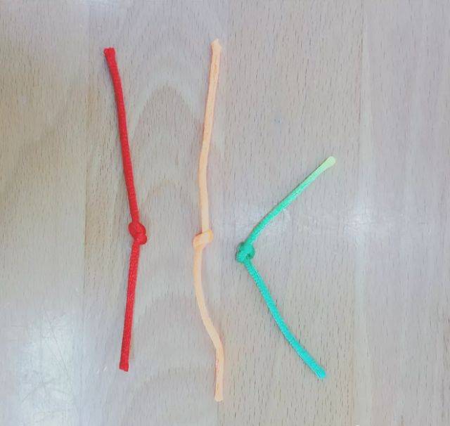 15,编辫子材料:一块硬的板,一个长尾夹,三根毛线一端系在一起.