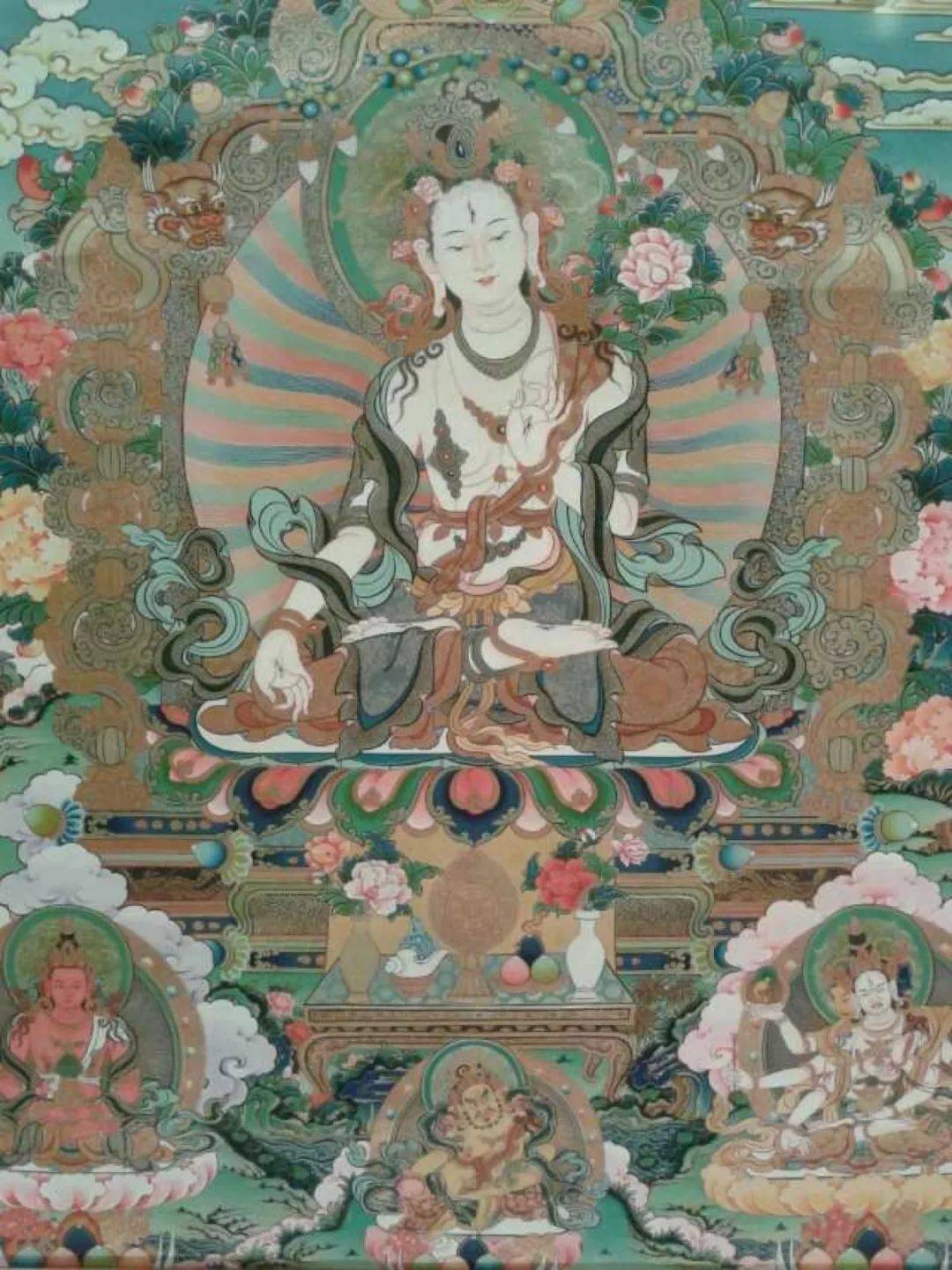 二章:皈依的观修行者必须要清楚明晰的来观想,在邬金大金刚持的头顶上