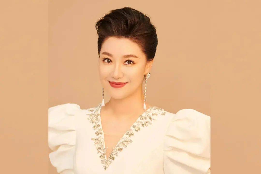 王丽达在多年的艺术实践中对民族声乐孜孜