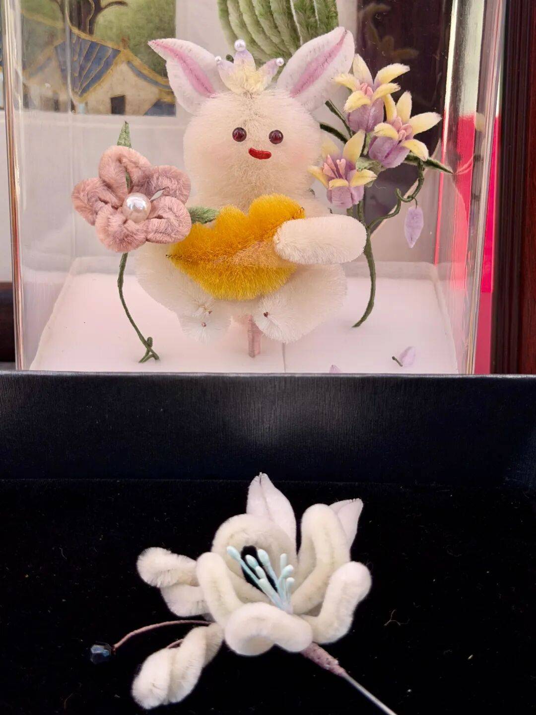 们学了大概有10种非遗在市集上展示了4种非遗掐丝珐琅画绒花绒鸟